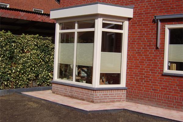 Erker met plat dak